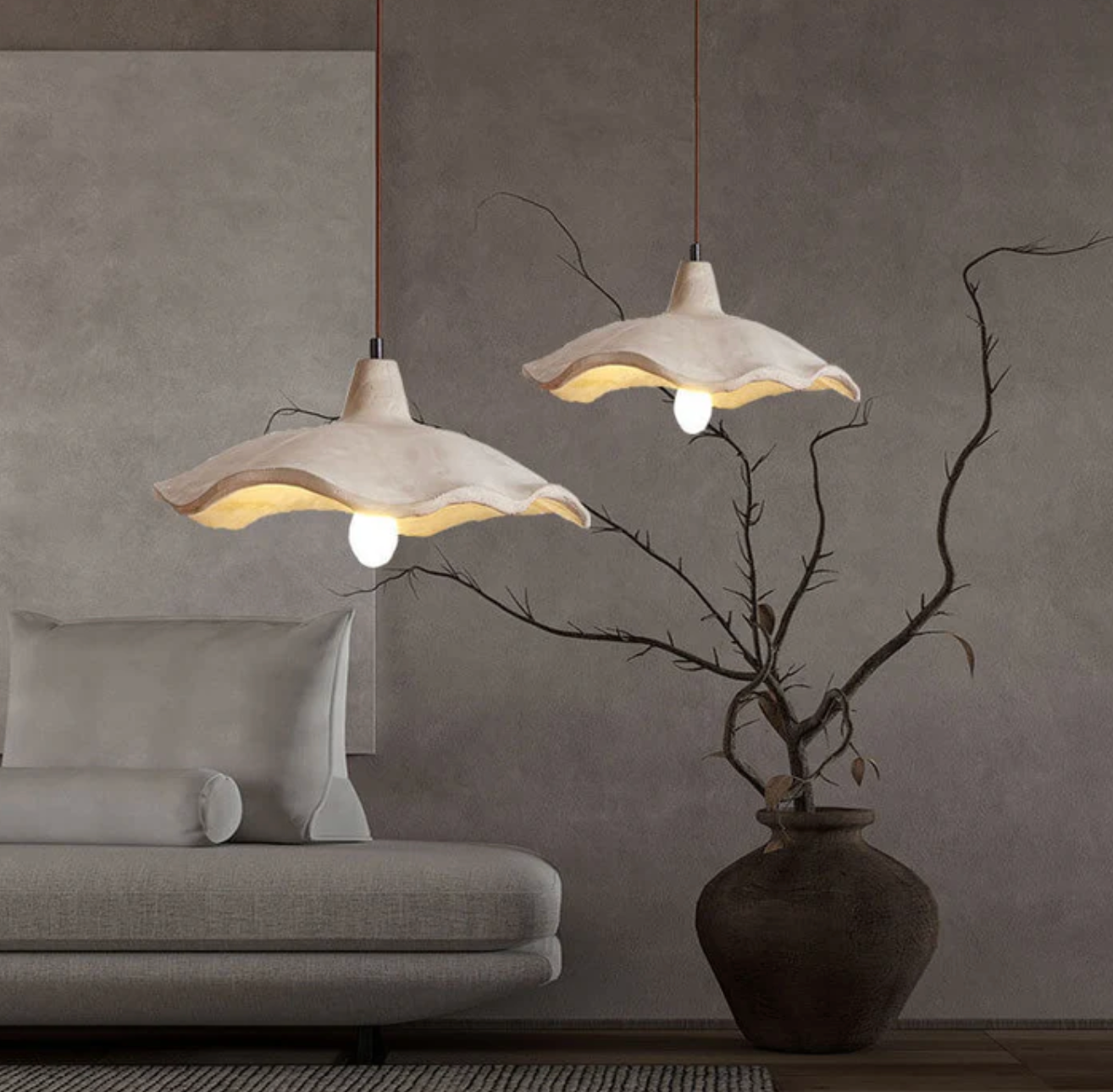Designerska lampa wisząca z betonowym kloszem – organiczna forma i naturalny charakter