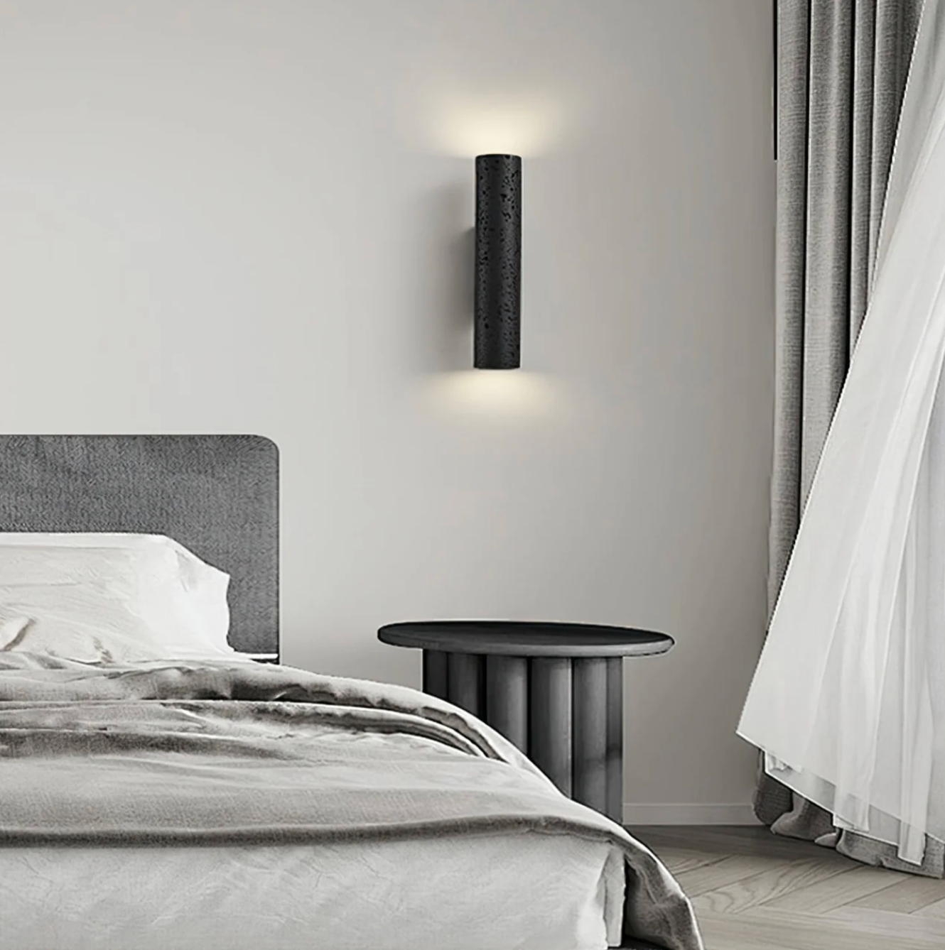Nowoczesna lampa ścienna tubowa – czarna, minimalistyczny kinkiet góra–dół