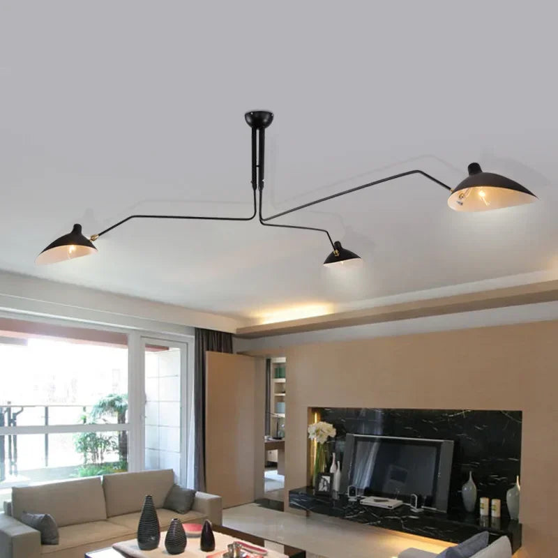 Czarna lampa sufitowa z obrotowymi ramionami – nowoczesny design