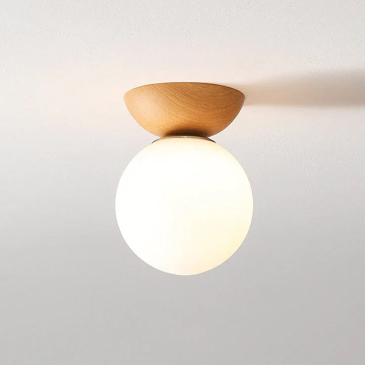 Nowoczesna lampa sufitowa w japońskim stylu  z drewnianą bazą – minimalistyczna kula