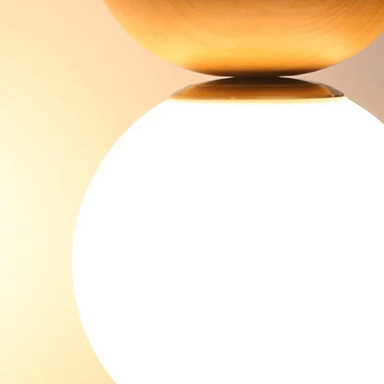 Nowoczesna lampa sufitowa w japońskim stylu  z drewnianą bazą – minimalistyczna kula