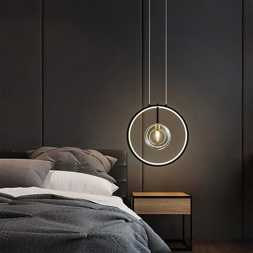 Nowoczesna lampa wisząca LED w formie okręgu z centralnym źródłem światła