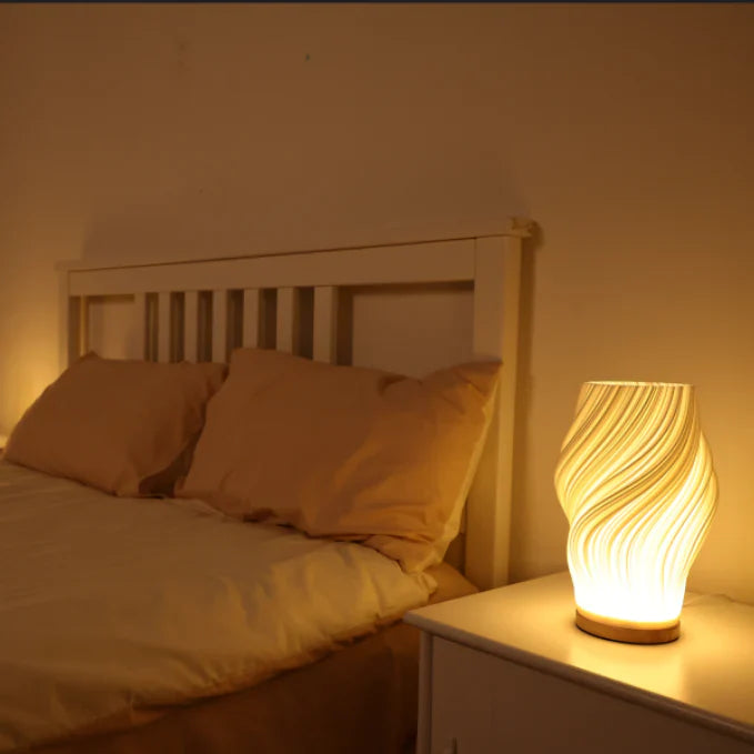 Designerska lampa stołowa LED o spiralnym kształcie