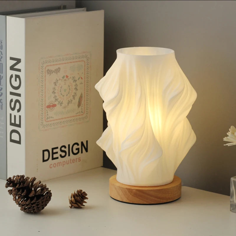 Designerska lampa stołowa LED o spiralnym kształcie