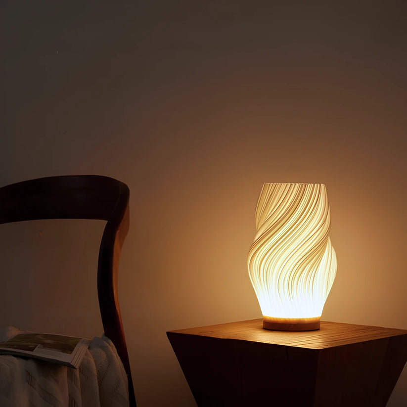 Designerska lampa stołowa LED o spiralnym kształcie